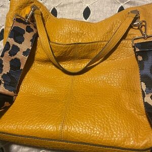 Leather bag with cross body strap. Vince Camuto , gold hardware.